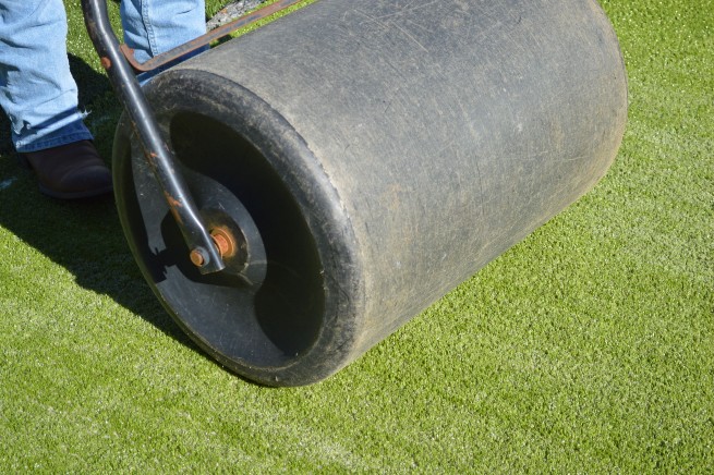Asheville artificial grass installation - top layer rolled